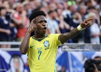 MIAMI GARDENS, FLORIDA - JUNE 24: Vinicius Junior #7 of Brazil celebrates scoring his team's second goal during the FIFA World Cup 2026 Group C match between Scotland and Brazil at Miami Stadium on June 24, 2026 in Miami Gardens, Florida. (Photo by Carmen Mandato - FIFA/FIFA via Getty Images)