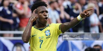 MIAMI GARDENS, FLORIDA - JUNE 24: Vinicius Junior #7 of Brazil celebrates scoring his team's second goal during the FIFA World Cup 2026 Group C match between Scotland and Brazil at Miami Stadium on June 24, 2026 in Miami Gardens, Florida. (Photo by Carmen Mandato - FIFA/FIFA via Getty Images)