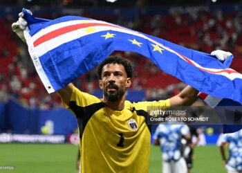 Cape Verde's goalkeeper #01 Vozinha celebrates with his national flag at the end of the 2026 World Cup Group H football match between Spain and Cape Verde (Photo by ROBERTO SCHMIDT / AFP via Getty Images)