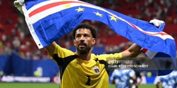 Cape Verde's goalkeeper #01 Vozinha celebrates with his national flag at the end of the 2026 World Cup Group H football match between Spain and Cape Verde (Photo by ROBERTO SCHMIDT / AFP via Getty Images)