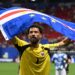 Cape Verde's goalkeeper #01 Vozinha celebrates with his national flag at the end of the 2026 World Cup Group H football match between Spain and Cape Verde (Photo by ROBERTO SCHMIDT / AFP via Getty Images)