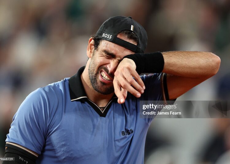 Matteo Berrettini of Italy reacts during their Men's Singles quarter-final match against Matteo Arnaldi of Italy on Day Eleven of the 2026 French Open (Photo by James Fearn/Getty Images)