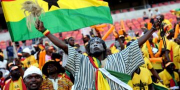 A Ghanian supporter cheers on (AFP PHOTO / STEPHANE DE SAKUTIN)
