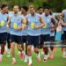 (LtoR) England's midfielder Morgan Rogers, England's midfielder Jordan Henderson, England's forward #09 Harry Kane, England's midfielder #10 Jude Bellingham and England's defender Dan Burn warm up during a training session as part of the team's preparation for its FIFA World Cup football tournament opening match against Croatia at the team's training camp in Palm Beach Gardens on June 9, 2026. (Photo by CHANDAN KHANNA / AFP via Getty Images)