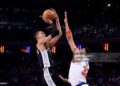 Victor Wembanyama #1 of the San Antonio Spurs shoots the ball over Karl-Anthony Towns #32 of the New York Knicks during the second quarter in Game Three of the 2026 NBA Finals at Madison Square Garden (Photo by Al Bello/Getty Images)
