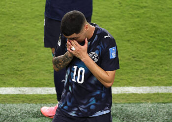 SANTA CLARA, CALIFORNIA - JUNE 19: Miguel Almiron #10 of Paraguay reacts after receiving a red card for covering his mouth while talking to another player during the FIFA World Cup 2026 Group D match between Türkiye and Paraguay at San Francisco Bay Area Stadium on June 19, 2026 in Santa Clara, California. (Photo by Stu Forster/Getty Images)