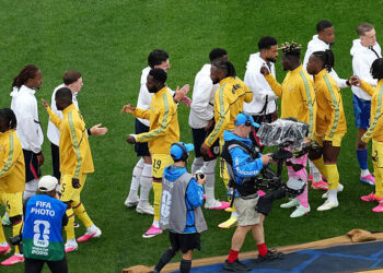 England's Djed Spence (left) appears to avoid a handshake with Ghana's Thomas Partey ahead of the FIFA World Cup Group L match at Boston Stadium. Former Arsenal midfielder Thomas Partey was heavily booed by England fans and Djed Spence appeared to snub a handshake with the Ghana international ahead of the clash in Boston. Picture date: Tuesday June 23, 2026. (Photo by Nick Potts/PA Images via Getty Images)