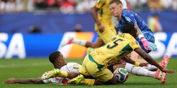 FOXBOROUGH, MASSACHUSETTS - JUNE 23: Prince Adu #25 of Ghana is challenged by Ezri Konsa #2 of England in the penalty box during the FIFA World Cup 2026 Group L match between England and Ghana at Boston Stadium on June 23, 2026 in Foxborough, Massachusetts. (Photo by Patrick Smith - FIFA/FIFA via Getty Images)