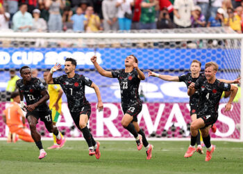 Stephen Eustaquio #7 of Canada celebrates scoring his team's first goal with team mates during the FIFA World Cup 2026 Round Of 32 match between South Africa and Canada at Los Angeles Stadium on June 28, 2026 in Inglewood, California. (Photo by Fran Santiago/Getty Images)