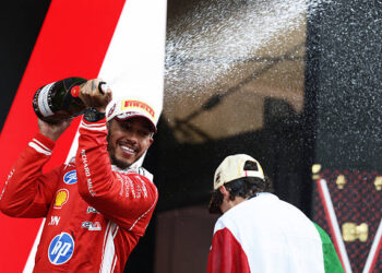 Second placed Lewis Hamilton of Great Britain and Scuderia Ferrari sprays Champagne on the podium during the F1 Grand Prix of Monaco at Circuit de Monaco on June 07, 2026 in Monte-Carlo, Monaco. (Photo by Mark Thompson/Getty Images)