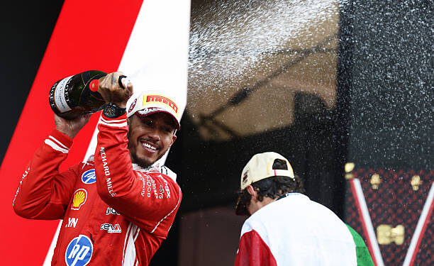 Second placed Lewis Hamilton of Great Britain and Scuderia Ferrari sprays Champagne on the podium during the F1 Grand Prix of Monaco at Circuit de Monaco on June 07, 2026 in Monte-Carlo, Monaco. (Photo by Mark Thompson/Getty Images)