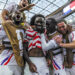 United States of America forward Folarin Balogun (20), center, celebrates with teammates after his second goal during the first half of a World Cup group stage match between United States and Paraguay at the SoFi Stadium on Friday, June 12, 2026 in Inglewood, CA. (Robert Gauthier / Los Angeles Times via Getty Images)