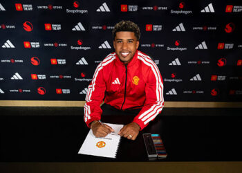 Andrey Santos of Manchester United poses after signing for the club at Carrington Training Ground on July 13, 2026 in Manchester, England. (Photo by Manchester United/Manchester United via Getty Images)