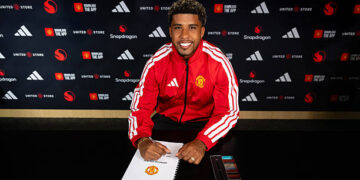 Andrey Santos of Manchester United poses after signing for the club at Carrington Training Ground on July 13, 2026 in Manchester, England. (Photo by Manchester United/Manchester United via Getty Images)