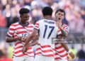 Malik Tillman #17 of the United States celebrates with team mates Alex Freeman #16 and Christian Pulisic #10 after scoring his team's second goal during the FIFA World Cup 2026 Round of 32 match between USA and Bosnia and Herzegovina (Photo by Alex Pantling - FIFA/FIFA via Getty Images)