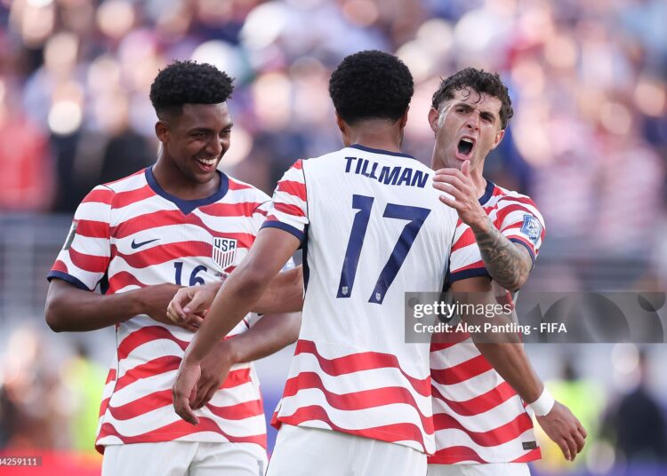 Malik Tillman #17 of the United States celebrates with team mates Alex Freeman #16 and Christian Pulisic #10 after scoring his team's second goal during the FIFA World Cup 2026 Round of 32 match between USA and Bosnia and Herzegovina (Photo by Alex Pantling - FIFA/FIFA via Getty Images)