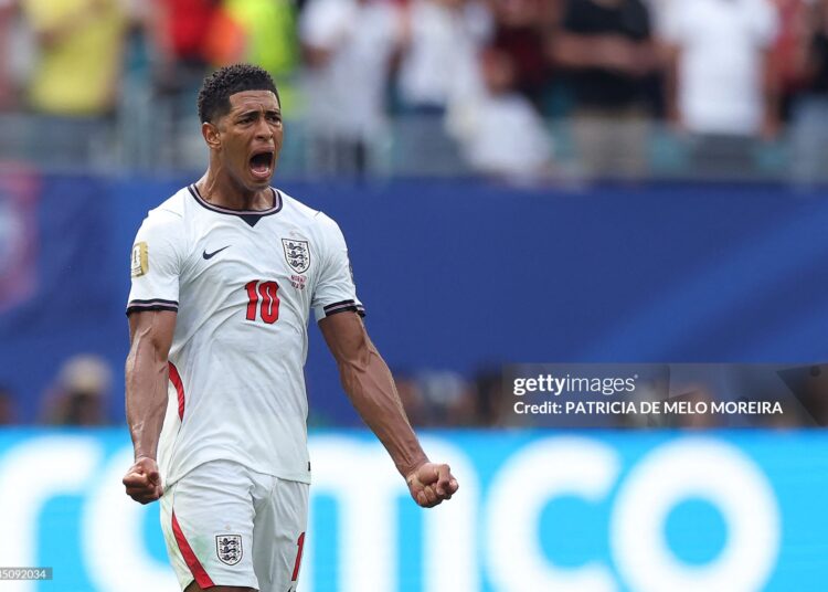 England's midfielder #10 Jude Bellingham celebrates after scoring the equalising goal during the 2026 World Cup football tournament quarter-final match between Norway and England  (Photo by PATRICIA DE MELO MOREIRA / AFP via Getty Images)