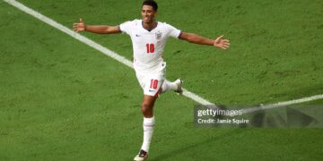 Jude Bellingham #10 of England celebrates scoring his team's sixth goal during the FIFA World Cup 2026 Bronze Final between France and England  (Photo by Jamie Squire/Getty Images)