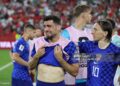 Mateo Kovacic #8 and Luka Modric #10 of Croatia react after the 1-2 loss during the FIFA World Cup 2026 Round of 32 match between Portugal and Croatia (Photo by Patrick Smith - FIFA/FIFA via Getty Images)