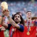 Marc Cucurella #24 of Spain celebrates with the FIFA World Cup Winner’s Trophy after the team’s victory following the FIFA World Cup 2026 Final match between Spain and Argentina (Photo by Carl Recine/Getty Images)