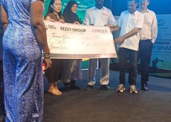 EEZZY Group chairman Mohammed Raii with his family presenting the donation