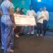 EEZZY Group chairman Mohammed Raii with his family presenting the donation