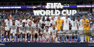 Players of England pose for a photograph with their bronze medals after the team's victory in the FIFA World Cup 2026 Bronze Final between France and England (Photo by Eddie Keogh - The FA/The FA via Getty Images)