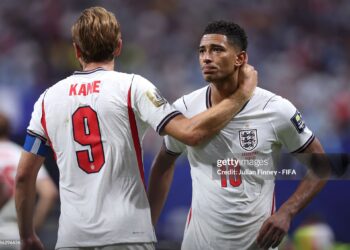 Harry Kane #9 of England consoles Jude Bellingham #10 of England after the FIFA World Cup 2026 Semi Final match between England and Argentina (Photo by Julian Finney - FIFA/FIFA via Getty Images)