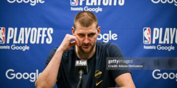 Nikola Jokic (15) of the Denver Nuggets speaks to members of the media after the Minnesota Timberwolves' 110-98 Game 6 NBA Playoffs series win at the Target Center in Minneapolis, Minnesota on Thursday, April 30, 2026. Minnesota eliminated the Nuggets 4-2. (Photo by AAron Ontiveroz/The Denver Post)