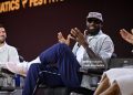 LeBron James speaks onstage during The Shop Live (Photo by Roy Rochlin/Getty Images for Fanatics)