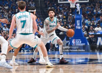 LaMelo Ball #1 of the Charlotte Hornets dribbles the ball during the game against the Orlando Magic during the SoFi NBA Play In (Photo by Fernando Medina/NBAE via Getty Images)