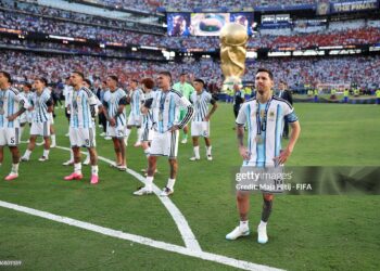 Lionel Messi #10 and players of Argentina watch players of Spain receiving the medals following the FIFA World Cup 2026 Final match between Spain and Argentina (Photo by Maja Hitij - FIFA/FIFA via Getty Images)