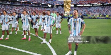 Lionel Messi #10 and players of Argentina watch players of Spain receiving the medals following the FIFA World Cup 2026 Final match between Spain and Argentina (Photo by Maja Hitij - FIFA/FIFA via Getty Images)