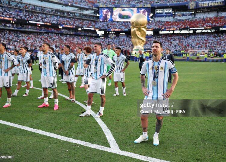 Lionel Messi #10 and players of Argentina watch players of Spain receiving the medals following the FIFA World Cup 2026 Final match between Spain and Argentina (Photo by Maja Hitij - FIFA/FIFA via Getty Images)