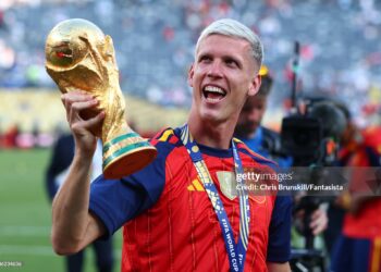 Dani Olmo of Spain celebrates with the trophy following his team's victory at the end of the FIFA World Cup 2026 Final match between Spain and Argentina (Photo by Chris Brunskill/Fantasista/Getty Images)