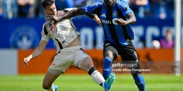 Robert Voloder #6 of Red Bull New York challenges Prince Owusu #9 of CF Montréal during the MLS match in the first half (Photo by Minas Panagiotakis/Getty Images)