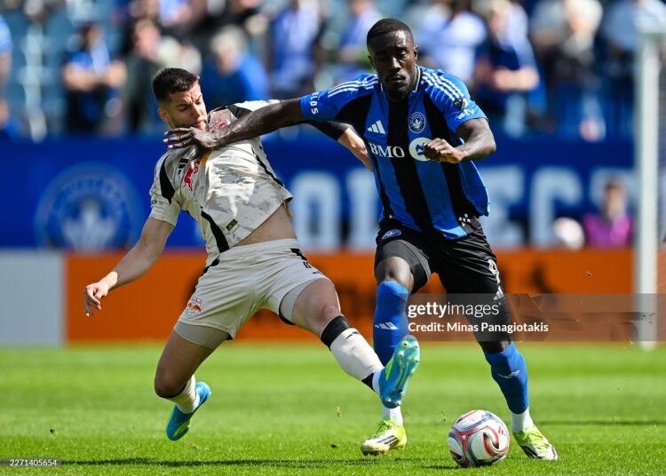 Robert Voloder #6 of Red Bull New York challenges Prince Owusu #9 of CF Montréal during the MLS match in the first half (Photo by Minas Panagiotakis/Getty Images)
