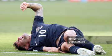 Christian Pulisic #10 of the United States reacts after challenged by Youri Tielemans #8 of Belgium during the FIFA World Cup 2026 Round of 16 match between USA and Belgium (Photo by Carl Recine/Getty Images)