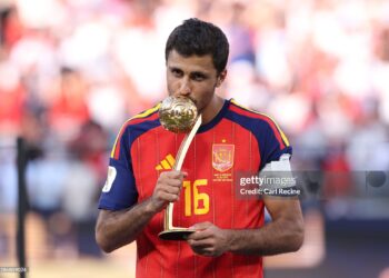 Rodri #16 of Spain is presented with the Golden Ball award after the FIFA World Cup 2026 Final match between Spain and Argentina (Photo by Carl Recine/Getty Images)
