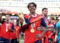 Lamine Yamal #19 of Spain celebrates with the FIFA World Cup Winner’s Trophy after the team’s victory following the FIFA World Cup 2026 Final match between Spain and Argentina (Photo by Alex Pantling - FIFA/FIFA via Getty Images)
