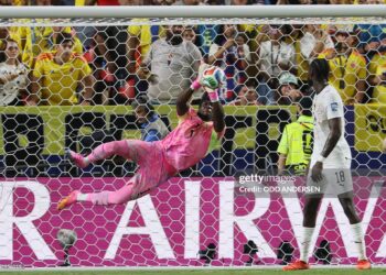 Ghana's goalkeeper #01 Lawrence Ati makes a save during the 2026 World Cup round of 32 football match between Colombia and Ghana (Photo by Odd ANDERSEN / AFP via Getty Images)