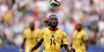 FOXBOROUGH, MASSACHUSETTS - JUNE 23: Gideon Mensah #14 of Ghana chases the ball during the FIFA World Cup 2026 Group L match between England and Ghana at Boston Stadium on June 23, 2026 in Foxborough, Massachusetts. (Photo by Patrick Smith - FIFA/FIFA via Getty Images)