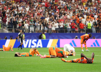 Ibrahim Sangare #18 of Cote d'Ivoire reacts after the 1-2 loss during the FIFA World Cup 2026 Round Of 32 match between Cote d'Ivoire and Norway at Dallas Stadium on June 30, 2026 in Arlington, Texas. (Photo by Molly Darlington/Getty Images)