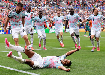Youri Tielemans #8 of Belgium celebrates scoring his team's third goal during the FIFA World Cup 2026 Round Of 32 match between Belgium and Senegal at Seattle Stadium on July 01, 2026 in Seattle, Washington. (Photo by Alex Grimm/Getty Images)
