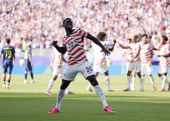 Folarin Balogun #20 of the United States celebrates scoring his team's first goal during the FIFA World Cup 2026 Round of 32 match between USA and Bosnia and Herzegovina at San Francisco Bay Area Stadium on July 01, 2026 in Santa Clara, California. (Photo by Alex Pantling - FIFA/FIFA via Getty Images)