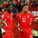 Breel Embolo #7 of Switzerland celebrates with Dan Ndoye #11 after scoring the team's first goal during the FIFA World Cup 2026 Round of 32 match between Switzerland and Algeria at BC Place Vancouver on July 02, 2026 in Vancouver, British Columbia. (Photo by Emilee Chinn/Getty Images)