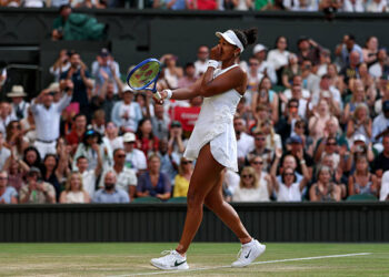 Naomi Osaka of Japan celebrates winning match point against Aryna Sabalenka during their Ladies' Singles fourth round match on day seven of The Championships Wimbledon 2026 at All England Lawn Tennis and Croquet Club on July 05, 2026 in London, England. (Photo by Cameron Spencer/Getty Images)