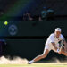Italy's Jannik Sinner slips on the ground as he returns to Germany's Alexander Zverev during their men's singles final tennis match on the fourteenth day of the 2026 Wimbledon Championships at The All England Lawn Tennis and Croquet Club in Wimbledon, southwest London, on July 12, 2026. (Photo by Kirill KUDRYAVTSEV / AFP via Getty Images) / RESTRICTED TO EDITORIAL USE