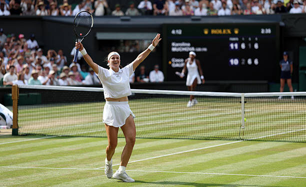 Karolina Muchova of Czechia celebrates winning match point against Coco Gauff of United States during their Ladies' Singles semifinal match on day eleven of The Championships Wimbledon 2026 at All England Lawn Tennis and Croquet Club on July 09, 2026 in London, England. (Photo by Clive Brunskill/Getty Images)