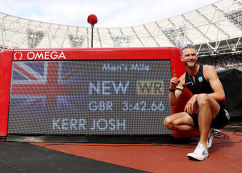 Josh Kerr of Team Great Britain celebrates after winning the 1 Mile Men's Final and setting a new World Record during the Novuna London Athletics Meet, part of the 2026 Wanda Diamond League, at London Stadium on July 18, 2026 in London, England. (Photo by Michael Steele/Getty Images)